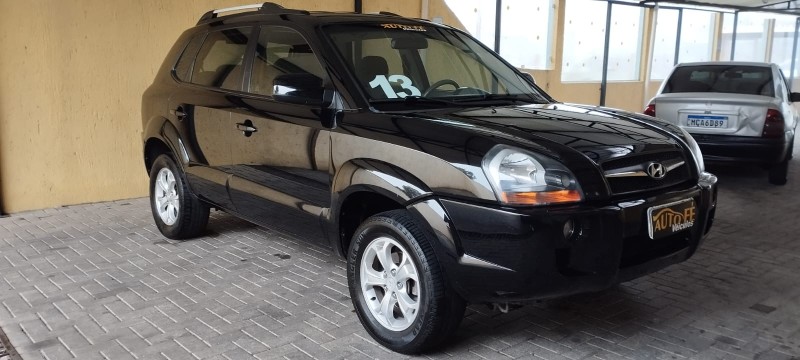 tucson 2.0 mpfi gls base 16v 143cv 2wd flex 4p automatico 2013 canela