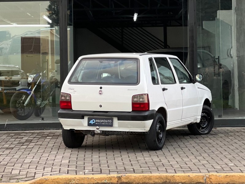 UNO 1.0 MPI MILLE WAY ECONOMY 8V FLEX 4P MANUAL - 2013 - ESTâNCIA VELHA