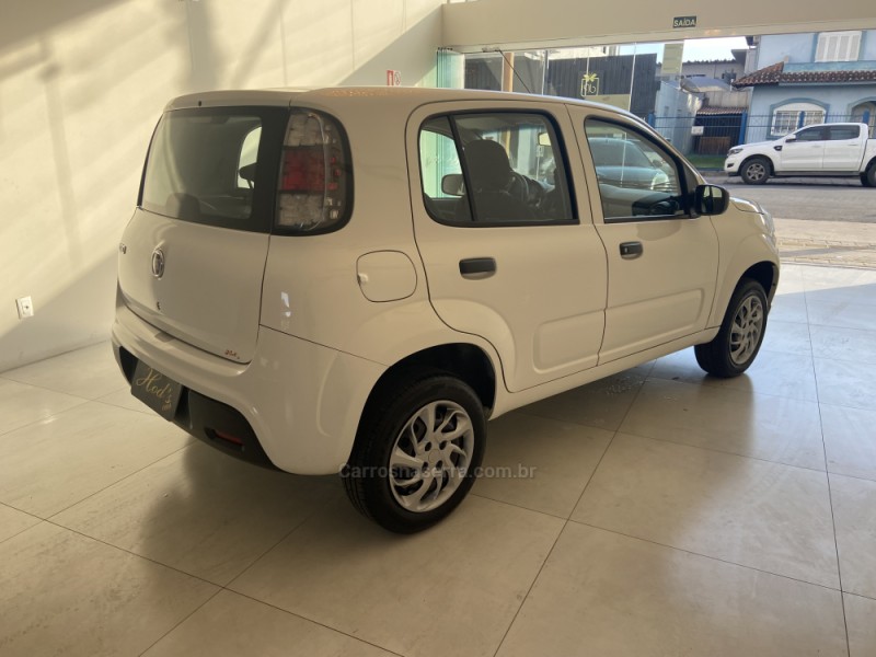 UNO 1.0 EVO ATTRACTIVE 8V FLEX 4P MANUAL - 2021 - CANELA