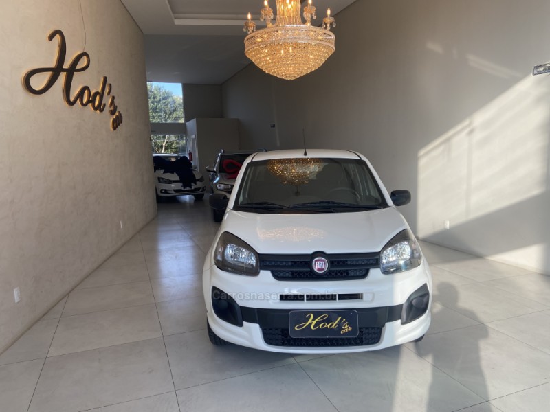 UNO 1.0 EVO ATTRACTIVE 8V FLEX 4P MANUAL - 2021 - CANELA