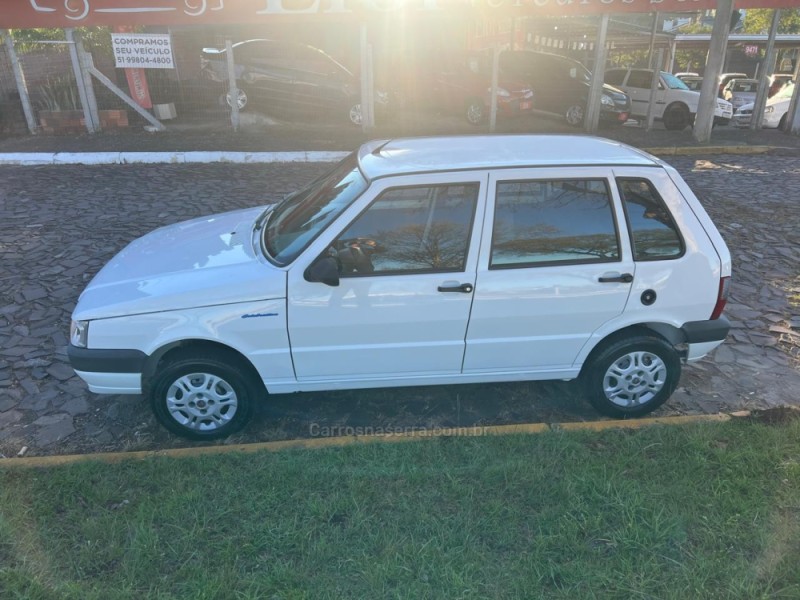 UNO 1.0 MPI MILLE FIRE ECONOMY 8V FLEX 4P MANUAL - 2010 - DOIS IRMãOS