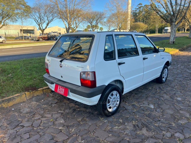 UNO 1.0 MPI MILLE FIRE ECONOMY 8V FLEX 4P MANUAL - 2010 - DOIS IRMãOS