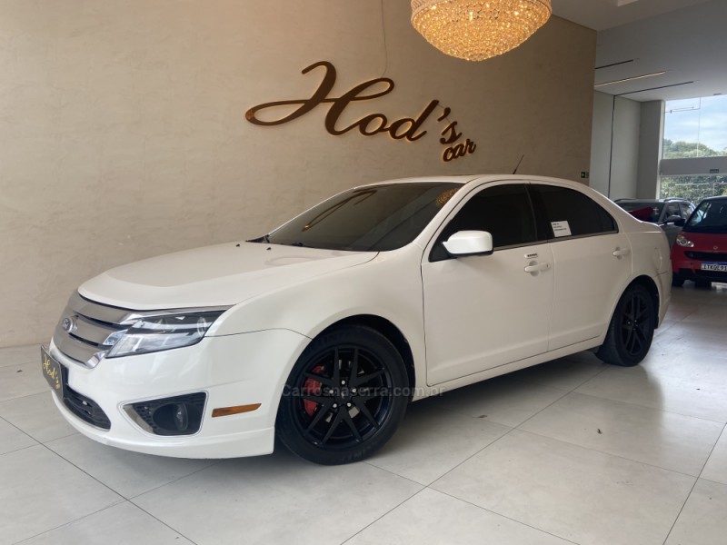 fusion 2.3 sel 16v gasolina 4p automatico 2010 canela