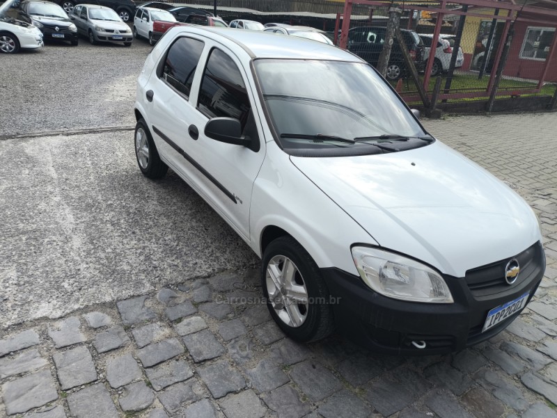 CELTA 1.0 MPFI LIFE 8V FLEX 4P MANUAL - 2009 - FARROUPILHA
