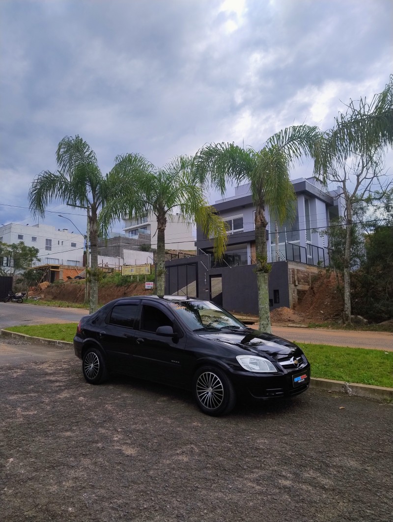 PRISMA 1.4 MPFI MAXX 8V FLEX 4P MANUAL - 2011 - CAMPO BOM