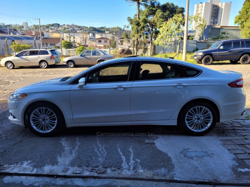 FUSION 2.0 TITANIUM GTDI ECOBOOST AWD AUTOMÁTICO - 2014 - CAXIAS DO SUL
