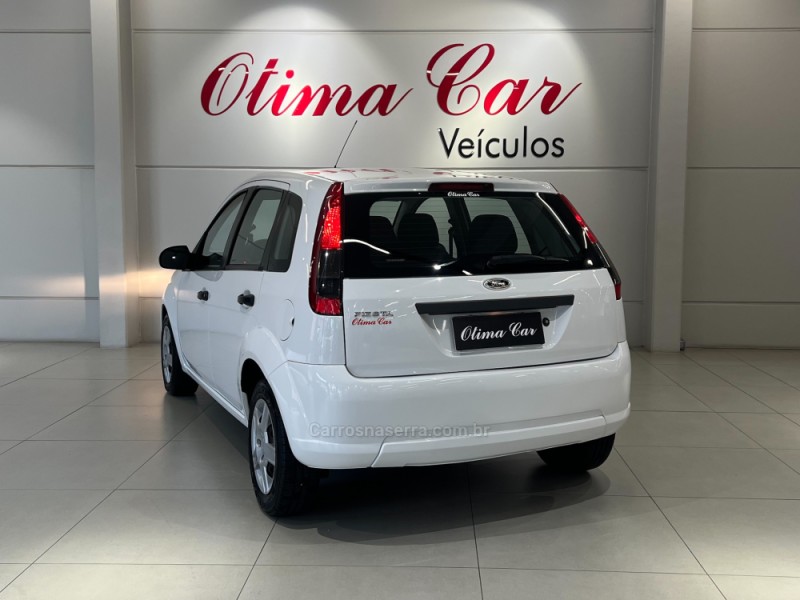 FIESTA 1.0 ROCAM HATCH 8V FLEX 4P MANUAL - 2013 - FLORES DA CUNHA