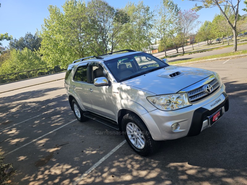 hilux sw4 2.8 srx 4x4 7 lugares 16v turbo intercooler diesel 4p automatico 2009 bento goncalves