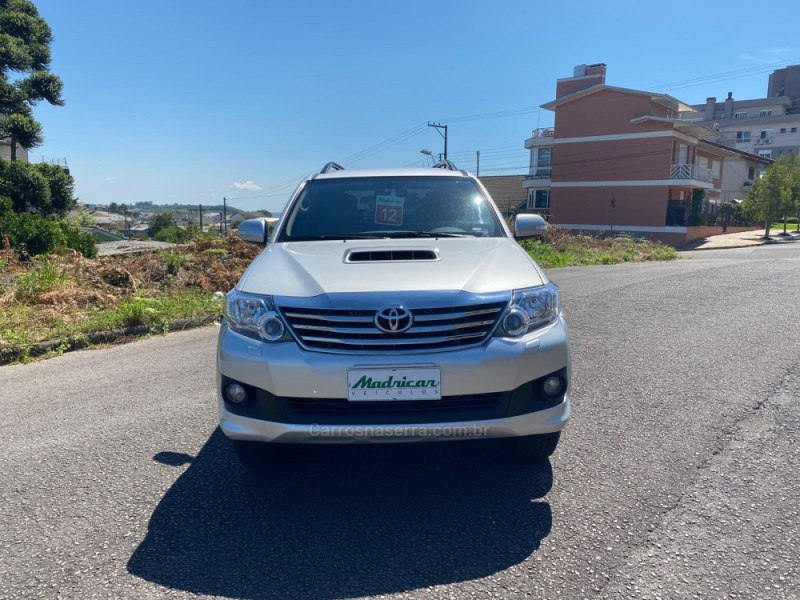 HILUX SW4 3.0 SRV 4X4 7 LUGARES 16V TURBO INTERCOOLER DIESEL 4P AUTOMÁTICO - 2012 - FLORES DA CUNHA