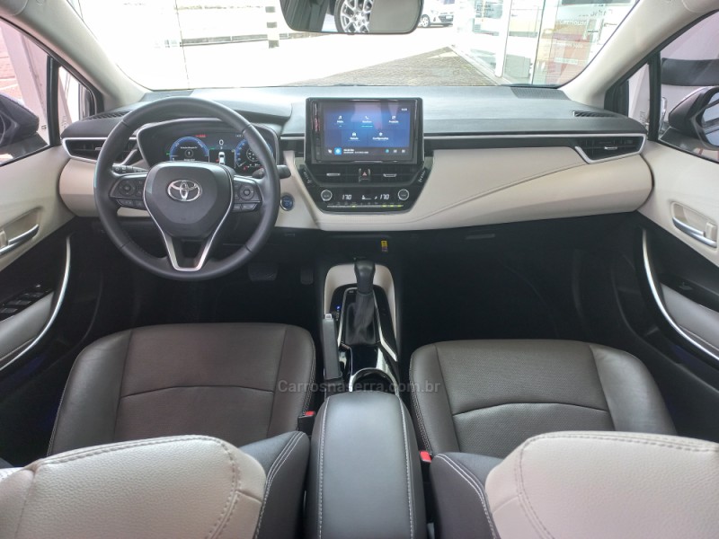 COROLLA 1.8 ALTIS PREMIUM 16V HÍBRIDO 4P AUTOMÁTICO - 2024 - TAQUARA