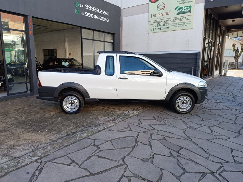 STRADA 1.4 MPI WORKING CE 8V FLEX 2P MANUAL - 2013 - FLORES DA CUNHA