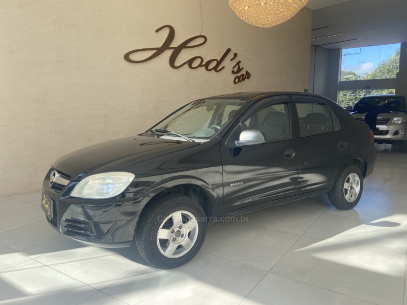 PRISMA 1.4 MPFI MAXX 8V FLEX 4P MANUAL - 2011 - CANELA