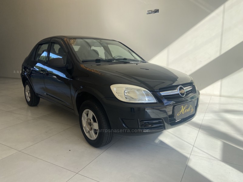 PRISMA 1.4 MPFI MAXX 8V FLEX 4P MANUAL - 2011 - CANELA