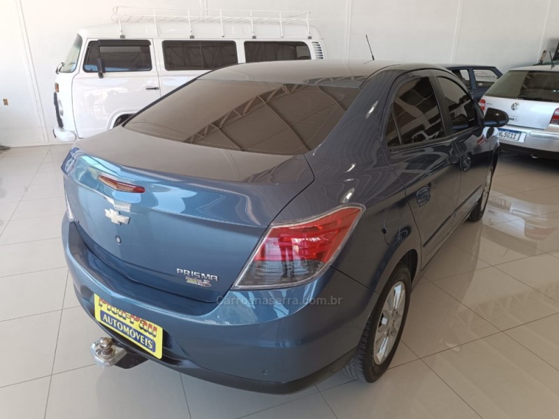 PRISMA 1.4 MPFI LTZ 8V FLEX 4P MANUAL - 2015 - NOVA PETRóPOLIS