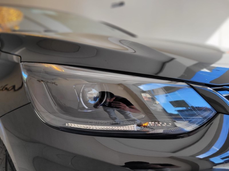 ONIX 1.0 HATCH RS 12V TURBO 4P AUTOMÁTICO - 2024 - CANELA
