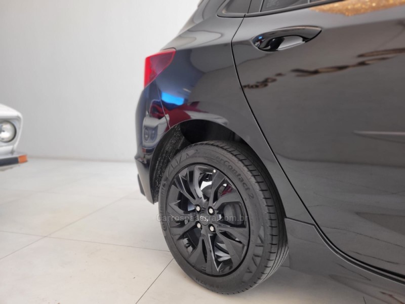 ONIX 1.0 HATCH RS 12V TURBO 4P AUTOMÁTICO - 2024 - CANELA
