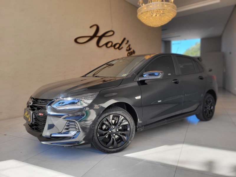 onix 1.0 hatch rs 12v turbo 4p automatico 2024 canela