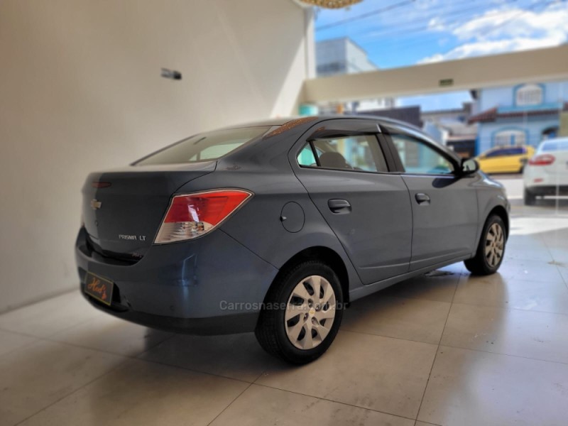 PRISMA 1.4 MPFI LT 8V FLEX 4P MANUAL - 2015 - CANELA