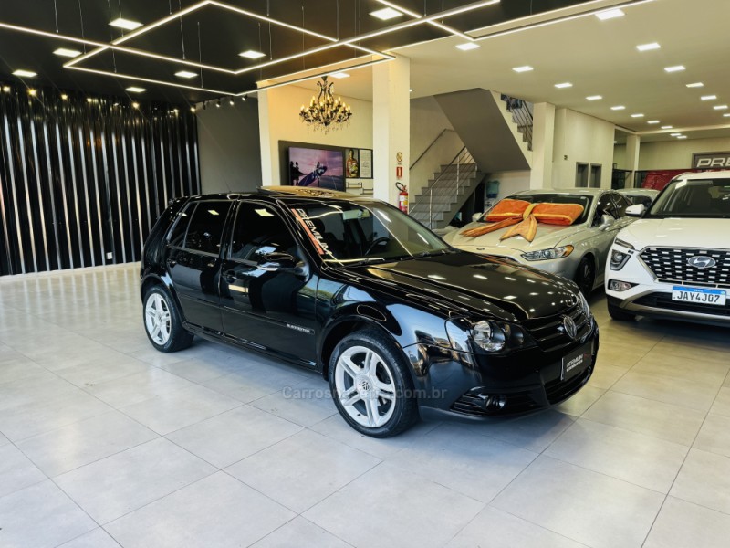 golf 2.0 mi black edition 8v flex 4p tiptronic 2010 dois irmaos