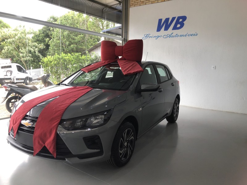 onix 1.0 12v flex 4p manual 2026 vale real