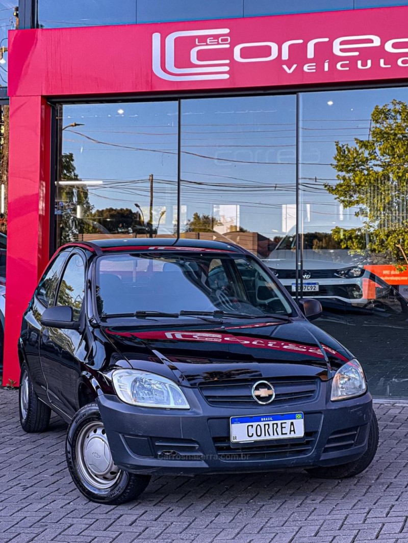 celta 1.0 mpfi ls 8v flex 2p manual 2010 canela