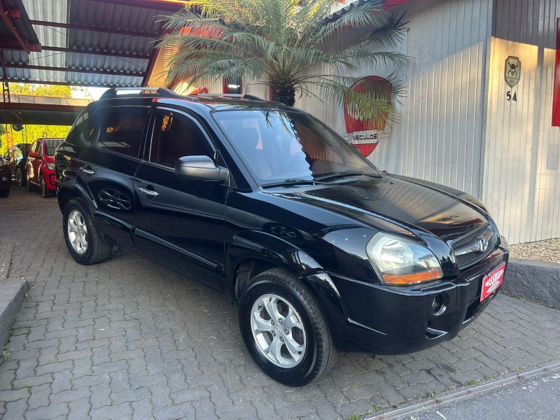 tucson 2.0 mpfi gl 16v 143cv 2wd gasolina 4p automatico 2010 tres coroas