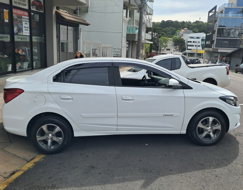 PRISMA 1.4 MPFI LTZ 8V FLEX 4P MANUAL - 2017 - FLORES DA CUNHA