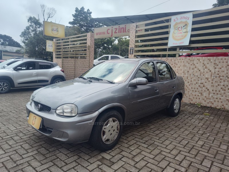 corsa 1.0 mpfi milenium ii sedan 8v gasolina 4p manual 2001 canela