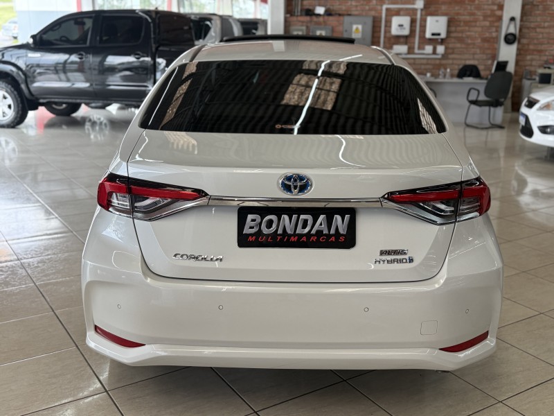 COROLLA 1.8 ALTIS PREMIUM 16V HÍBRIDO 4P AUTOMÁTICO - 2023 - FARROUPILHA