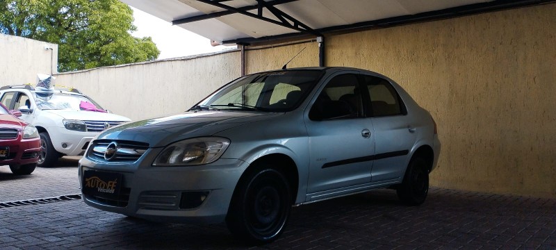 PRISMA 1.0 MPFI VHCE MAXX 8V FLEX 4P MANUAL - 2010 - CANELA