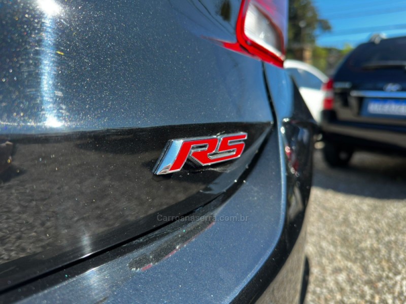 ONIX 1.0 HATCH RS 12V TURBO 4P AUTOMÁTICO - 2024 - CANELA