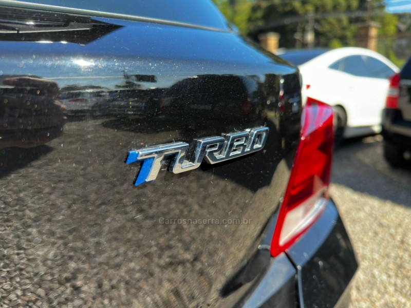 ONIX 1.0 HATCH RS 12V TURBO 4P AUTOMÁTICO - 2024 - CANELA