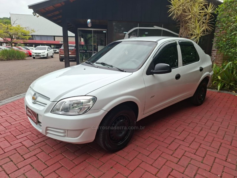 prisma 1.4 mpfi joy 8v flex 4p manual 2010 rolante
