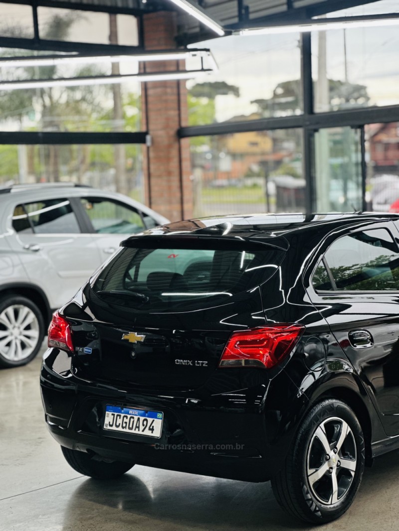 ONIX 1.4 MPFI LTZ 8V FLEX 4P MANUAL - 2017 - CANELA