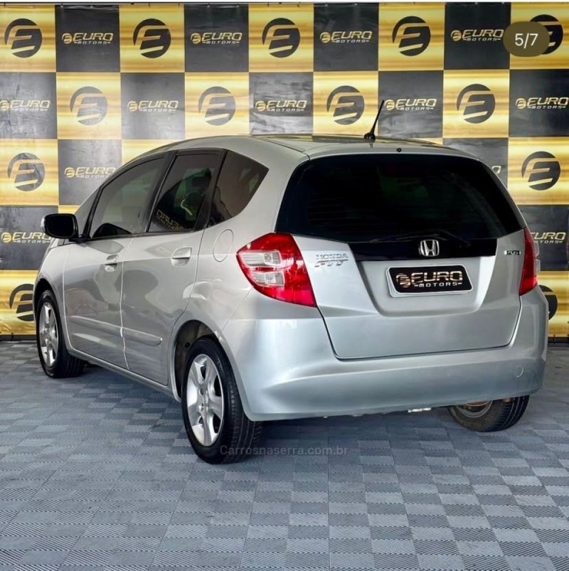 FIT 1.4 LXL 16V FLEX 4P MANUAL - 2009 - PORTãO