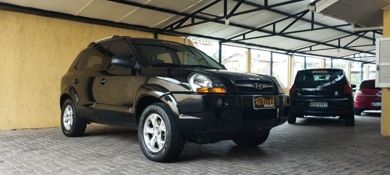 tucson 2.0 mpfi gl 16v 143cv 2wd gasolina 4p automatico 2010 canela