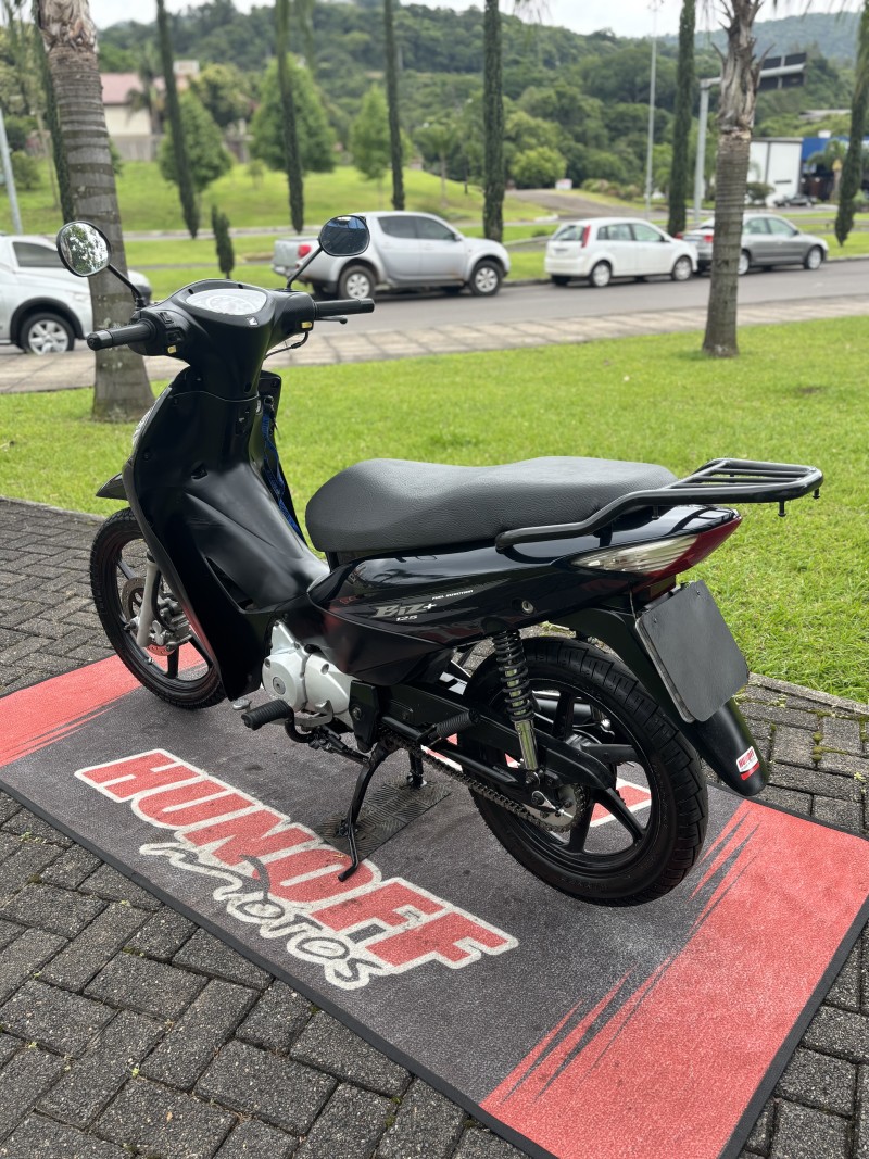 BIZ 125 + - 2010 - FELIZ