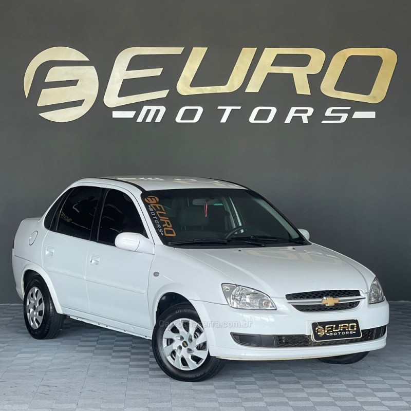 classic 1.0 mpfi ls 8v gasolina 4p manual 2014 portao