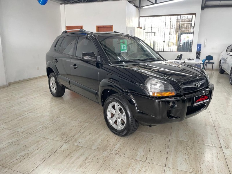 tucson 2.0 mpfi gls 16v 143cv 2wd gasolina 4p automatico 2013 caxias do sul