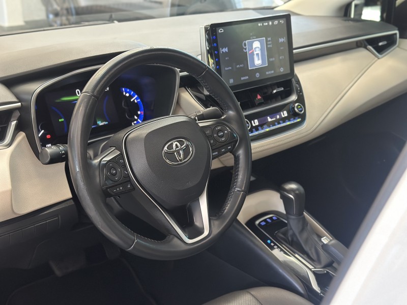 COROLLA 1.8 ALTIS PREMIUM 16V HÍBRIDO 4P AUTOMÁTICO - 2023 - ESTâNCIA VELHA