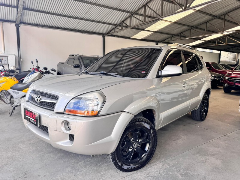 HYUNDAI - TUCSON - 2009/2010 - Dourada - R$ 41.900,00