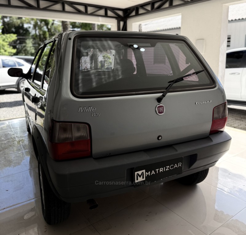 UNO 1.0 MPI MILLE WAY ECONOMY 8V FLEX 4P MANUAL - 2013 - CANELA