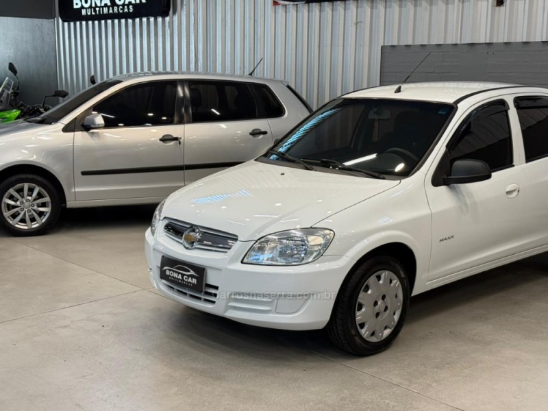 PRISMA 1.4 MPFI MAXX 8V FLEX 4P MANUAL - 2009 - CAXIAS DO SUL