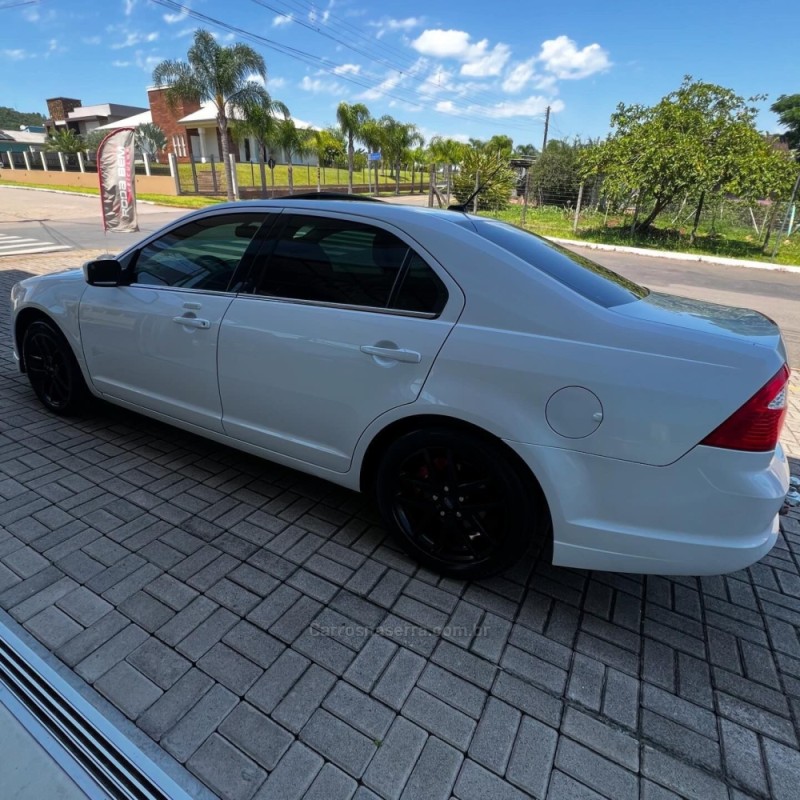 FUSION 3.0 SEL AWD V6 24V GASOLINA 4P AUTOMÁTICO - 2010 - FELIZ