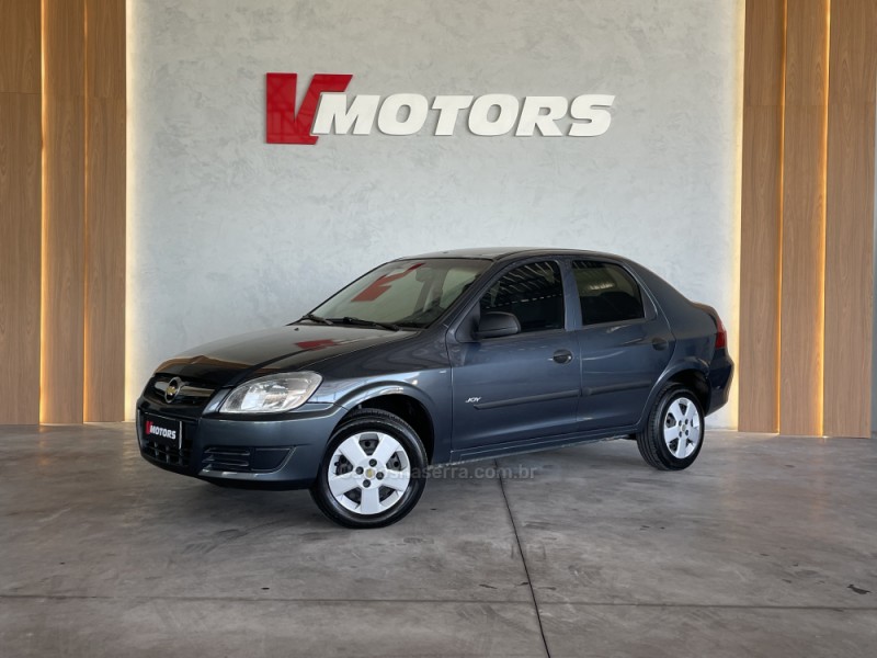 PRISMA 1.4 MPFI JOY 8V FLEX 4P MANUAL - 2009 - PAROBé