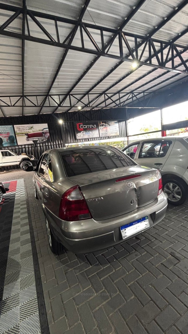 CORSA 1.0 MPFI JOY SEDAN 8V FLEX 4P MANUAL - 2005 - CANELA