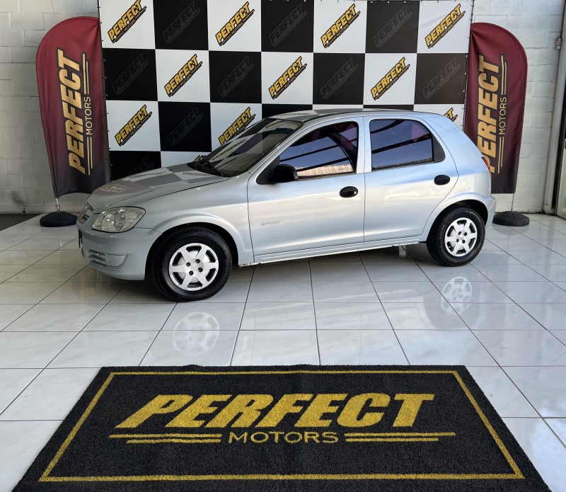 celta 1.0 mpfi spirit 8v flex 4p manual 2010 portao