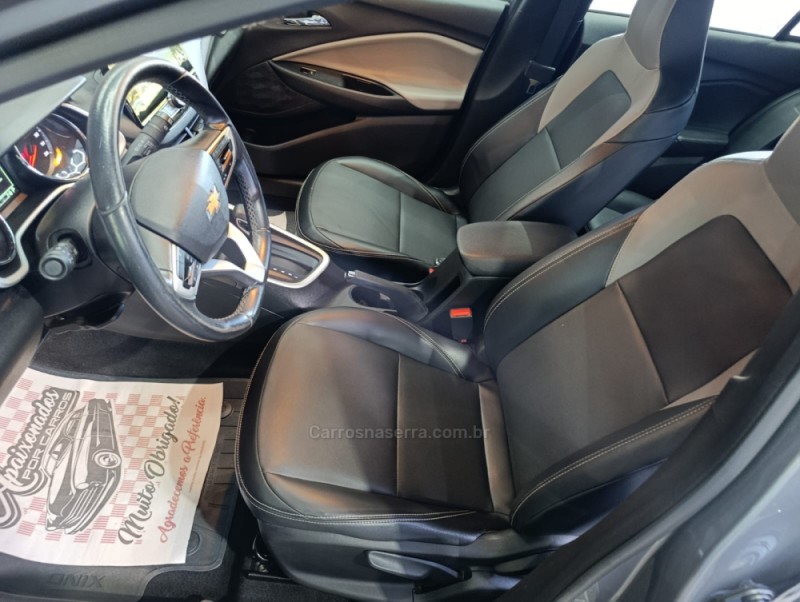 ONIX 1.0	PREMIER PLUS 12V TURBO FLEX 4P AUTOMÁTICO - 2023 - HARMONIA