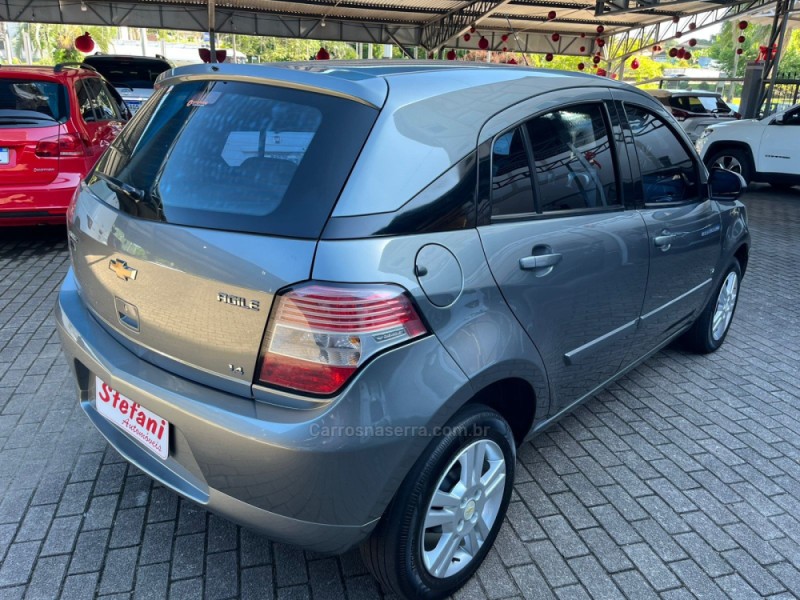 AGILE 1.4 MPFI LTZ 8V FLEX 4P MANUAL - 2011 - FELIZ