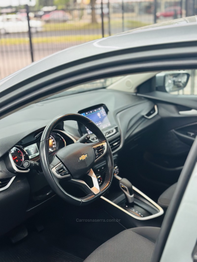 ONIX 1.0	LTZ PLUS 12V TURBO FLEX 4P AUTOMÁTICO - 2024 - CANELA